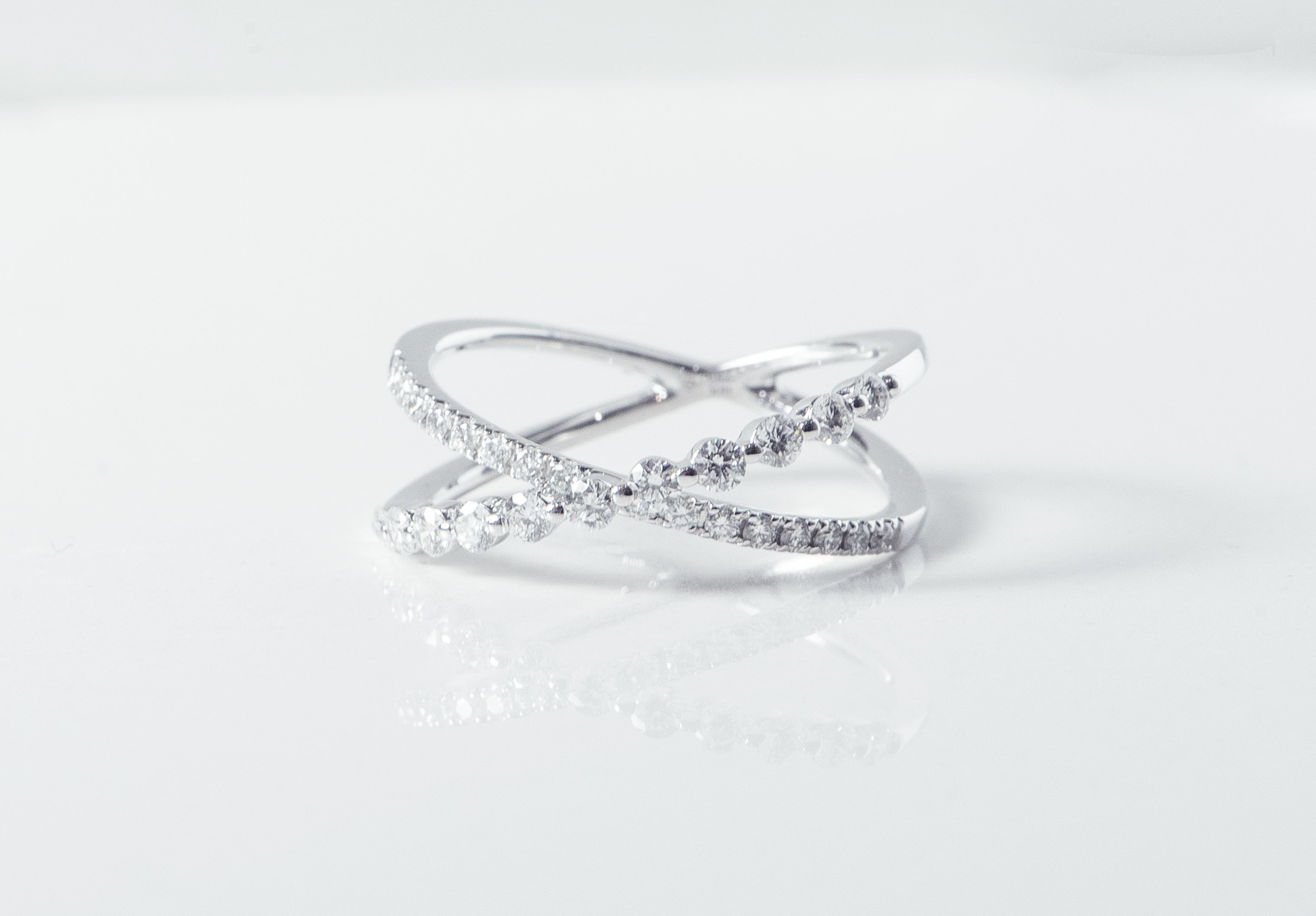 white gold and diamond ring. X ring. unique ring. fashion ring. april birthstone. round diamonds. shared prong. anniversary ring. SF jewelry, san francisco, jeweler, birthday gift, anniversary gift, gift for her, bay area jewelry, fine jewelry, luxury, hand made, artisan, local