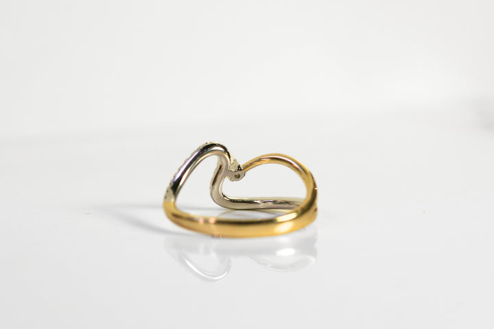 Back of the ring. Beyond the single diamond is an open hole to allow more light into the diamond and create more sparkle! Local SF jewelry, San francisco, Luxury, hand made, Bay area, gift for her.