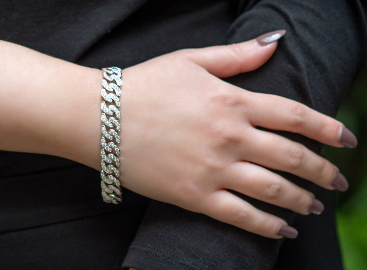 white gold and diamond cuban link bracelet.