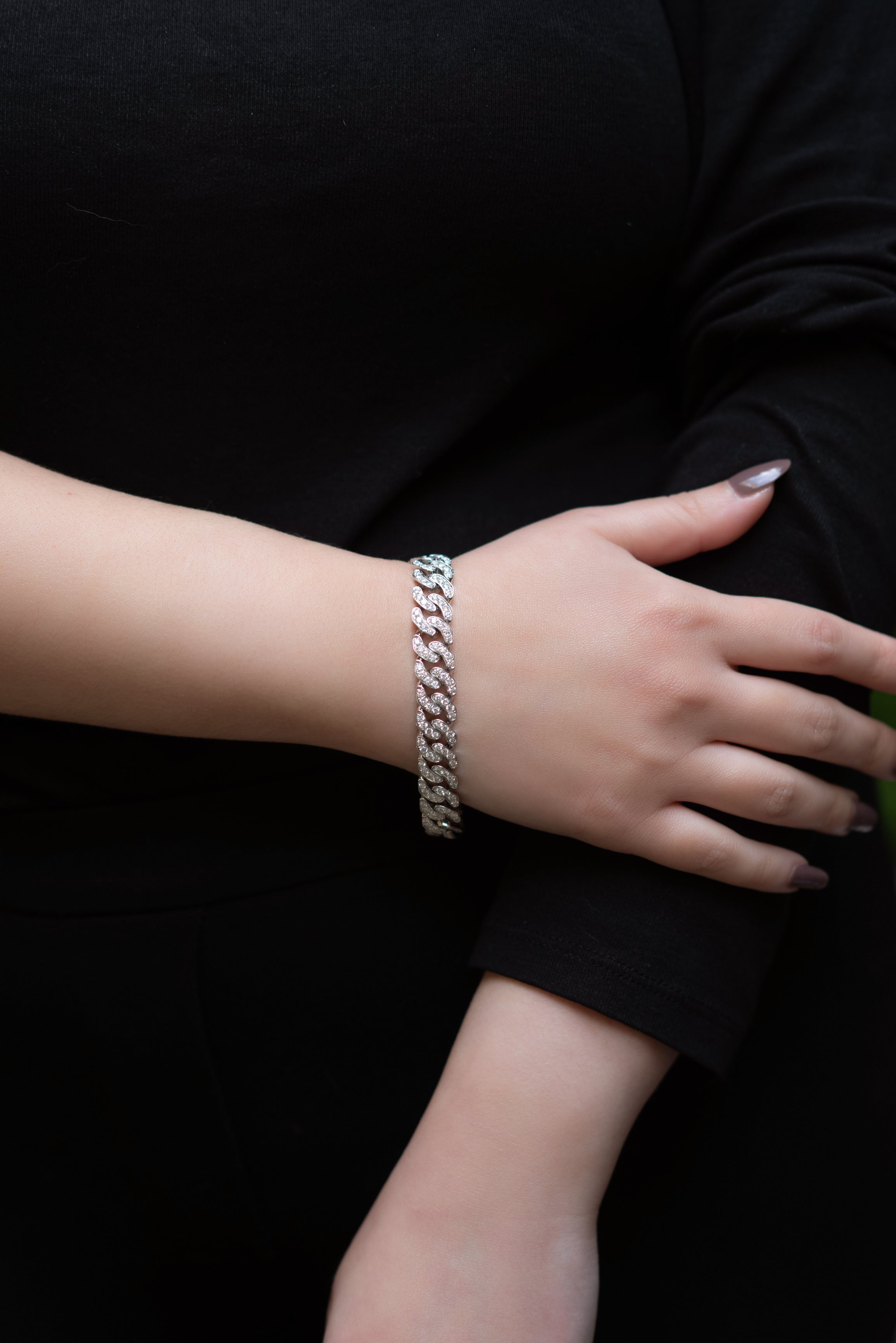 white gold and diamond cuban link bracelet.