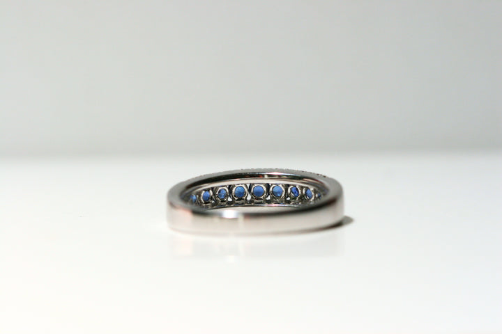 The back of the ring. The back of each sapphire is left open to allow maximum light in and create more sparkle. The back of the ring is solid white gold. Local SF jewelry, San francisco, Luxury, hand made, Bay area, gift for her, gift for him.