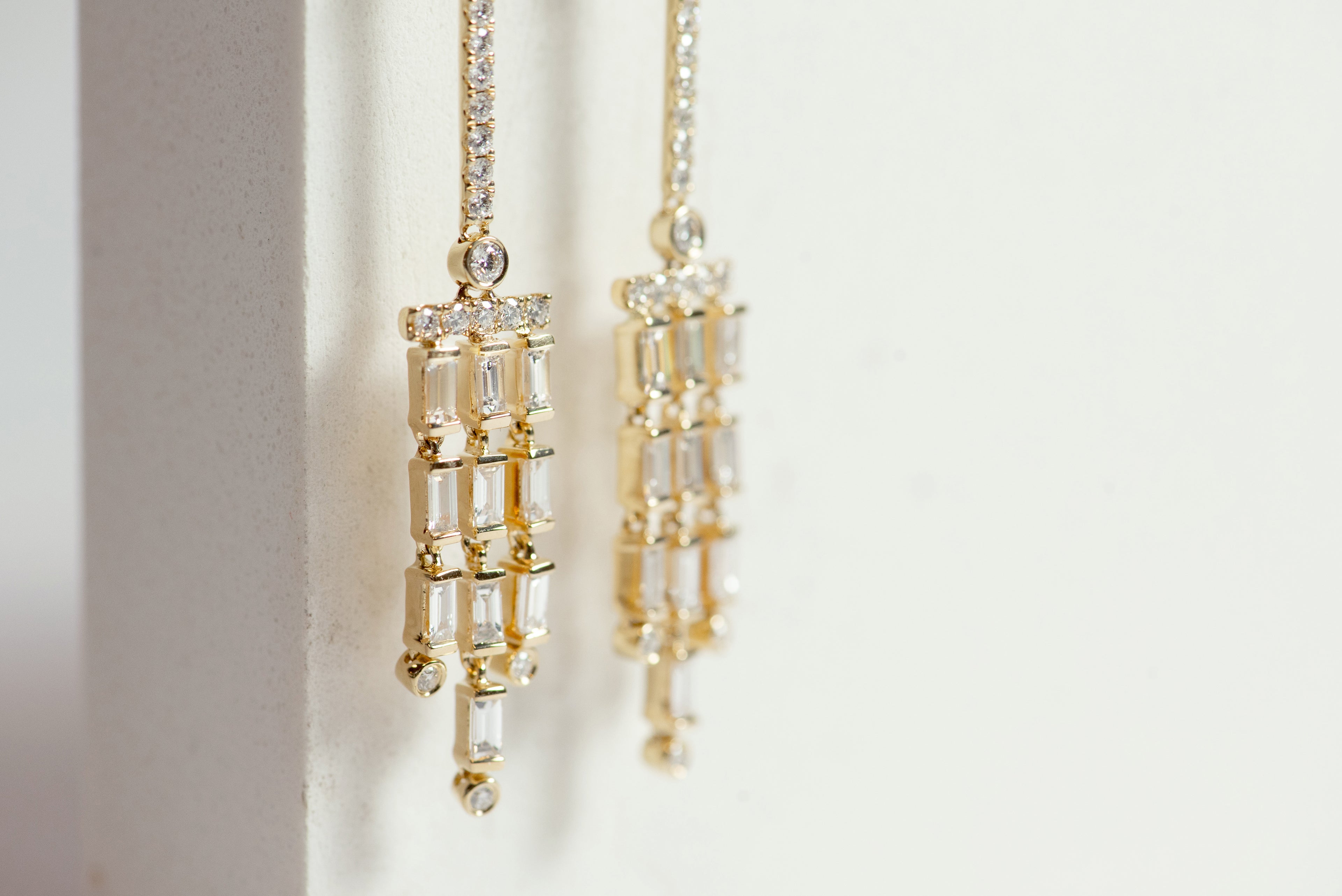 yellow gold and diamond dangle earrings. chandelier earrings. baguette diamonds. round diamonds. fine jewelry luxury. Local SF jewelry, San francisco, Luxury, hand made, Bay area, gift for her.