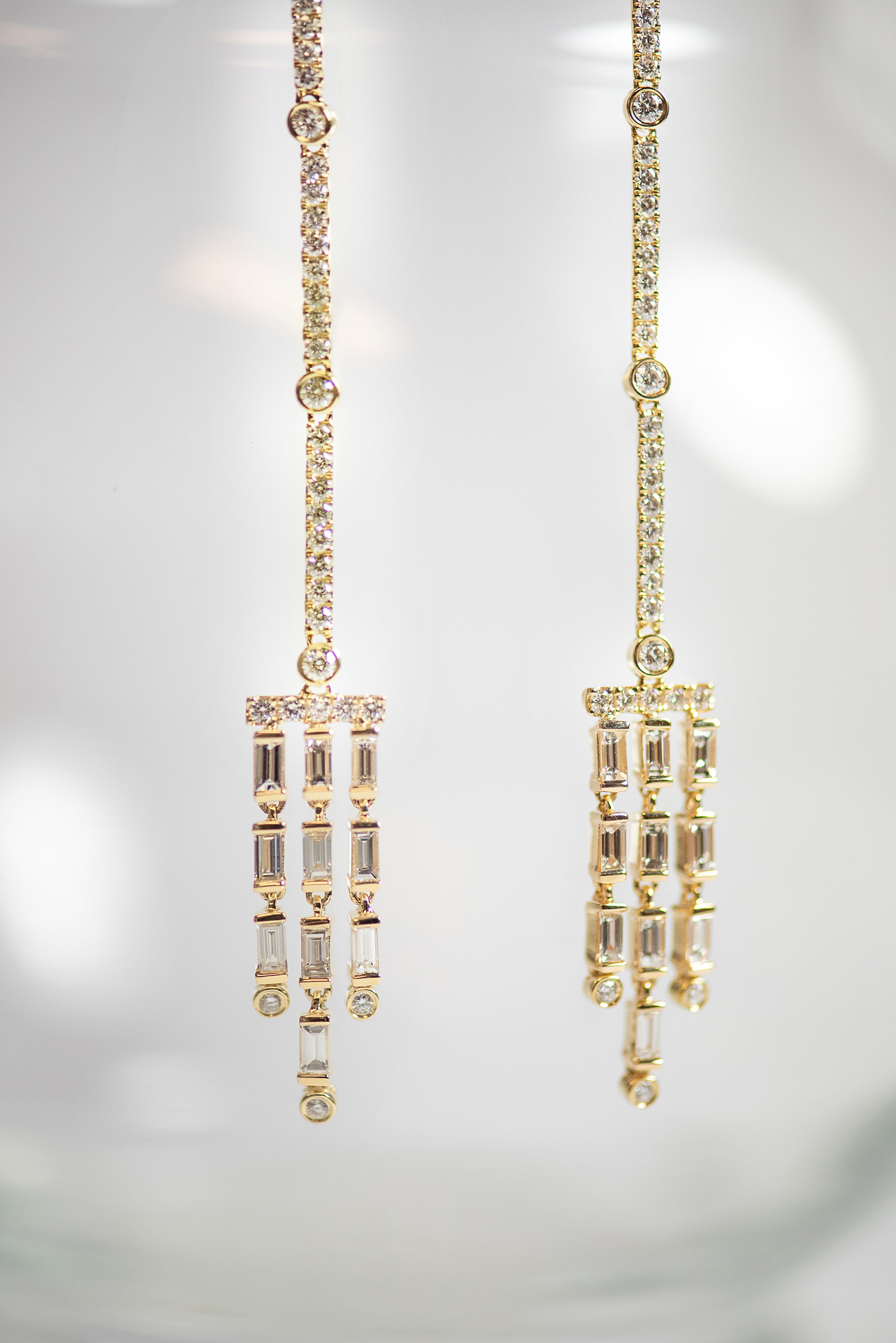 yellow gold and diamond dangle earrings. chandelier earrings. baguette diamonds. round diamonds. fine jewelry luxury. Local SF jewelry, San francisco, Luxury, hand made, Bay area, gift for her.