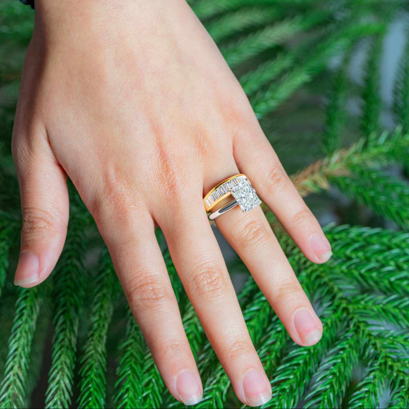 Julien Channel Set Baguette Diamond Band 18k yellow modeled on hand stacked with engagement ring 