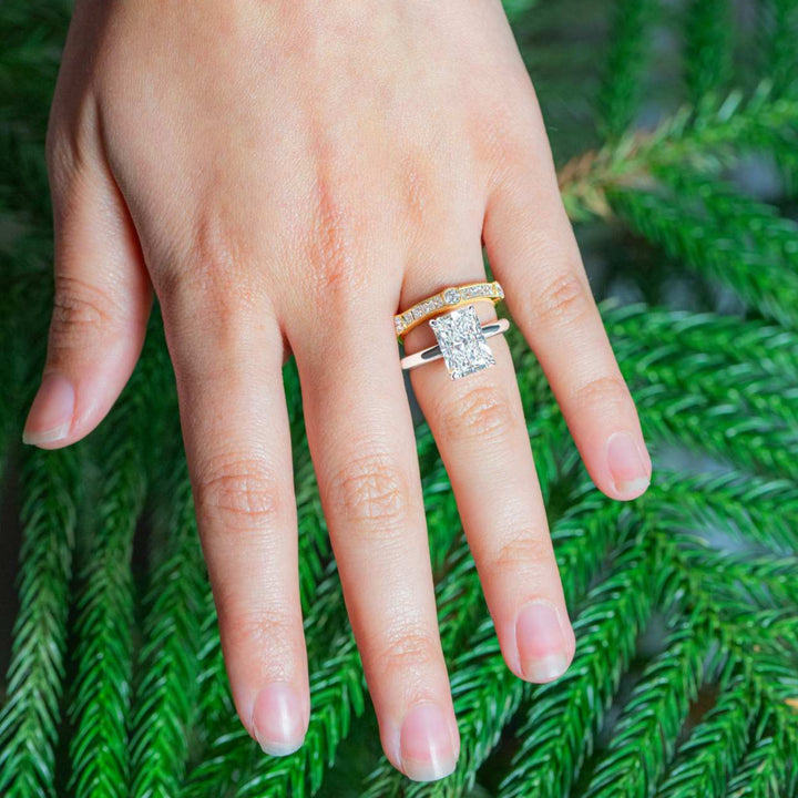 "Lavinia" Vintage-Inspired Round and Princess Cut Diamond Band in 18k yellow stacked with an engagement ring 