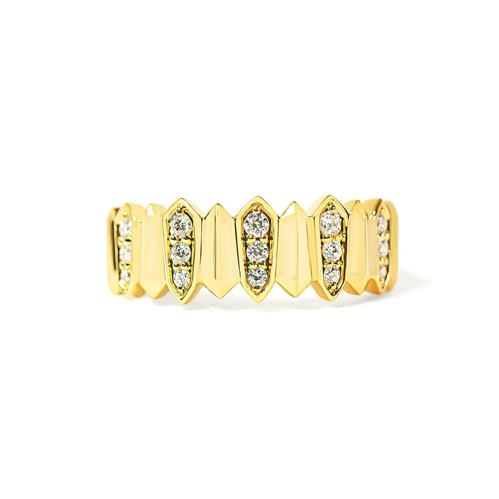 Gold ring with embedded diamonds on a white background