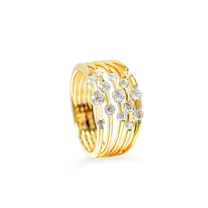 A gold multi-band ring featuring a staggered arrangement of round-cut diamonds of various sizes, photographed on a clean white background.