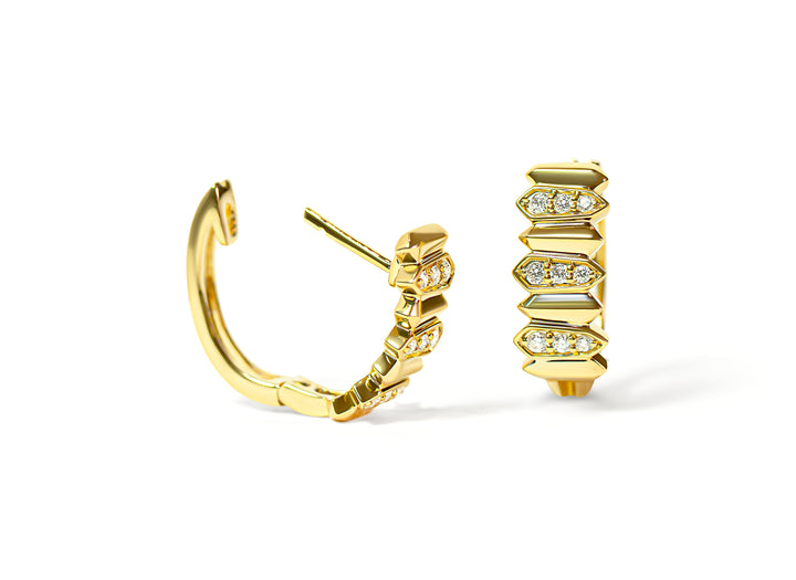 Gold hoop earrings with diamond accents on a white background