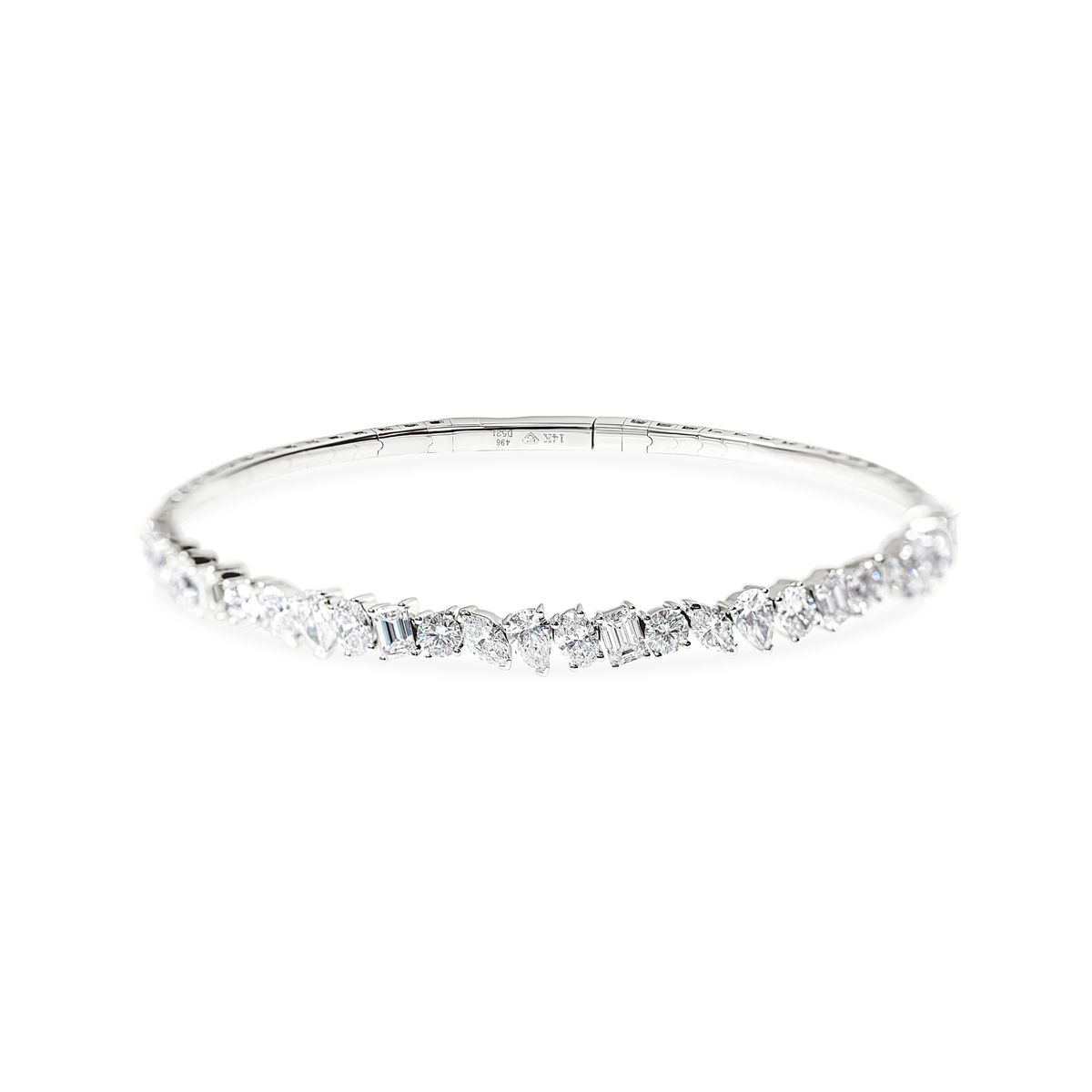 A slim silver-toned bangle bracelet with a row of white mixed-cut diamonds across the front, shown on a plain white background.