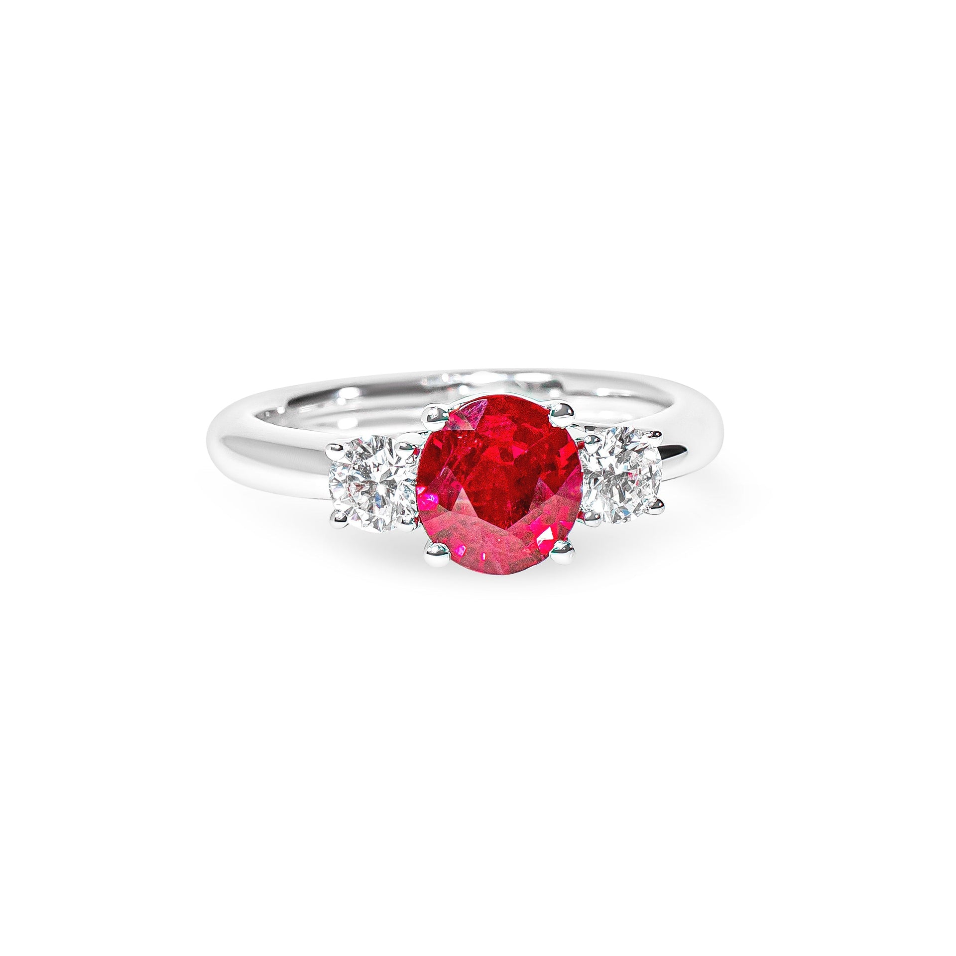 Platinum ring with a red ruby and diamonds on a white background