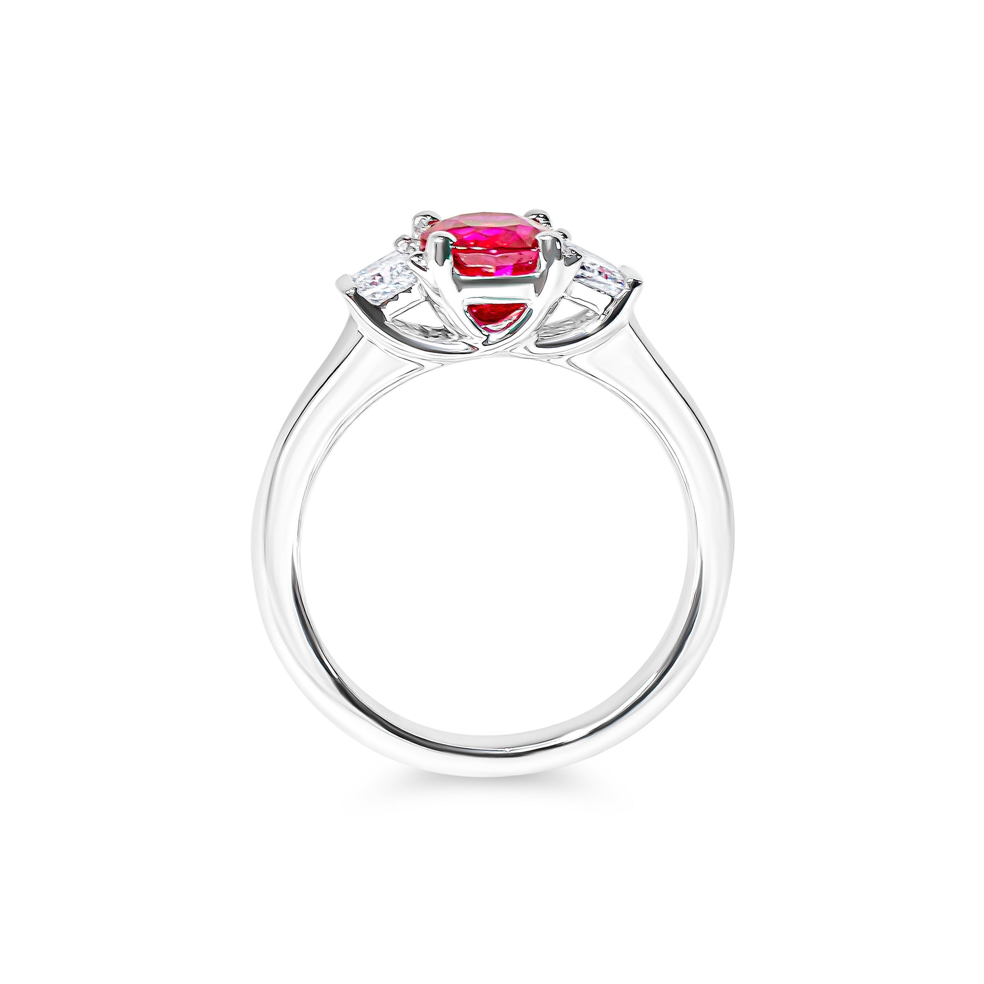 Platinum ring with a red ruby and diamond accents on a white background