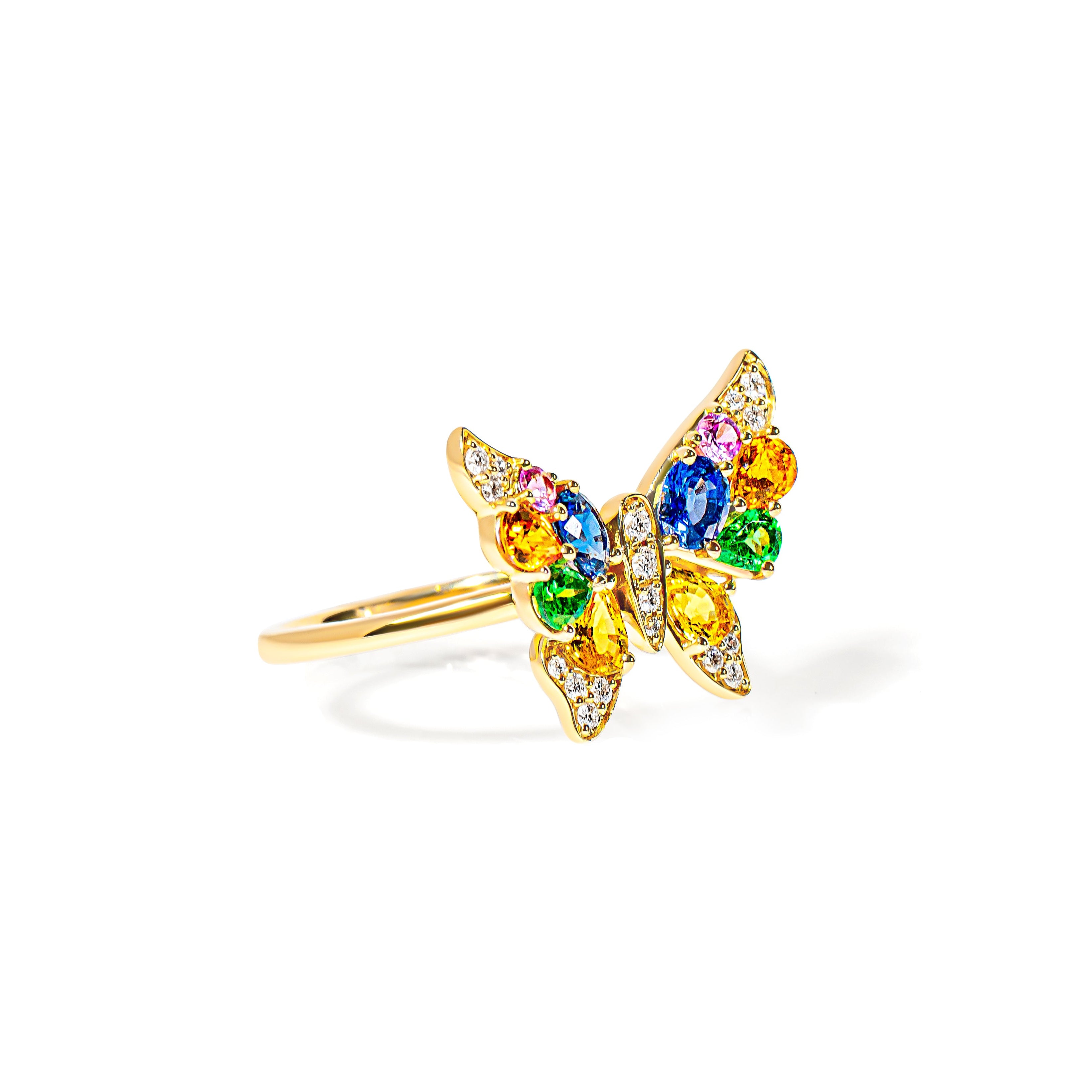Butterfly-shaped ring with colorful gemstones on a white background