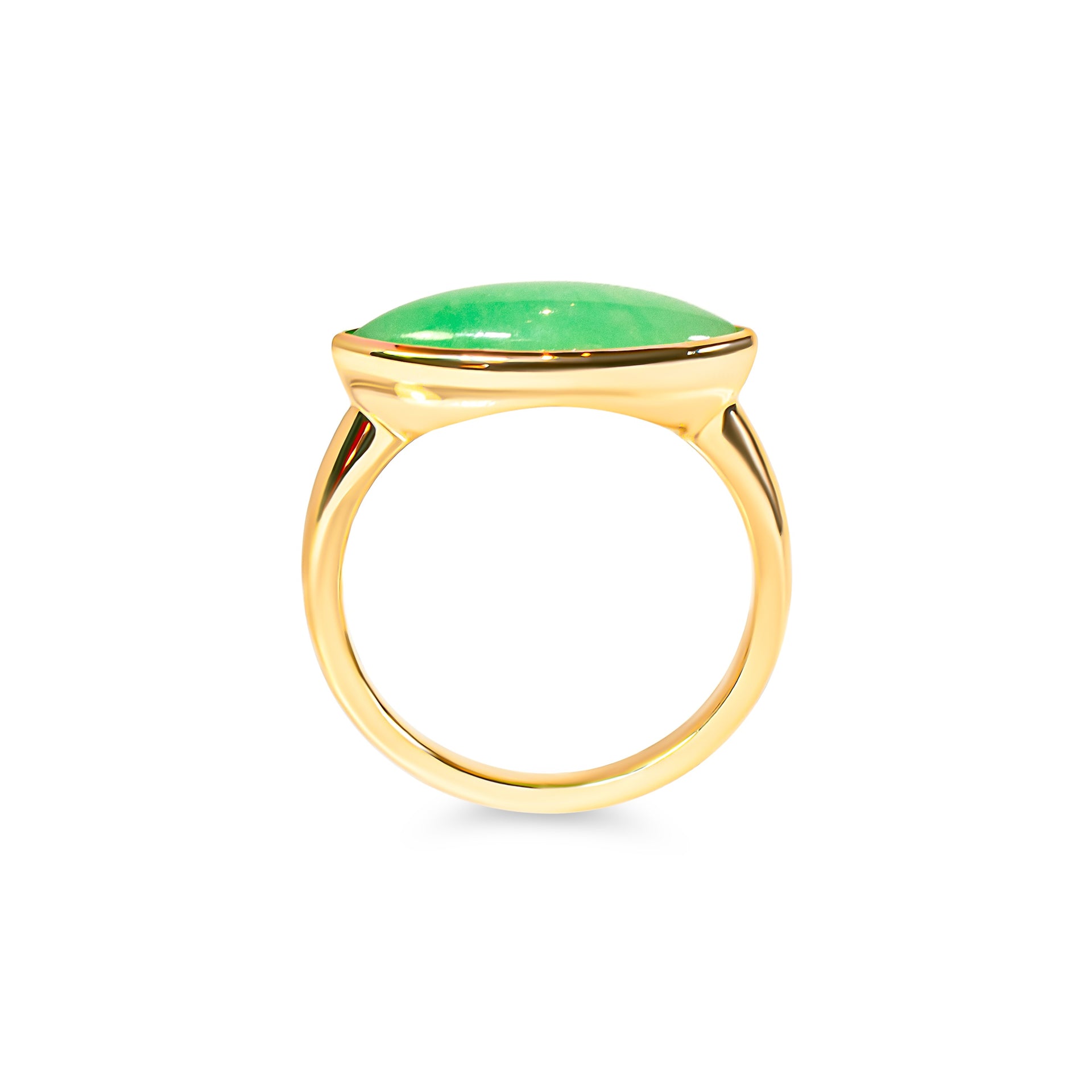 Gold ring with a marquise green jade on a white background