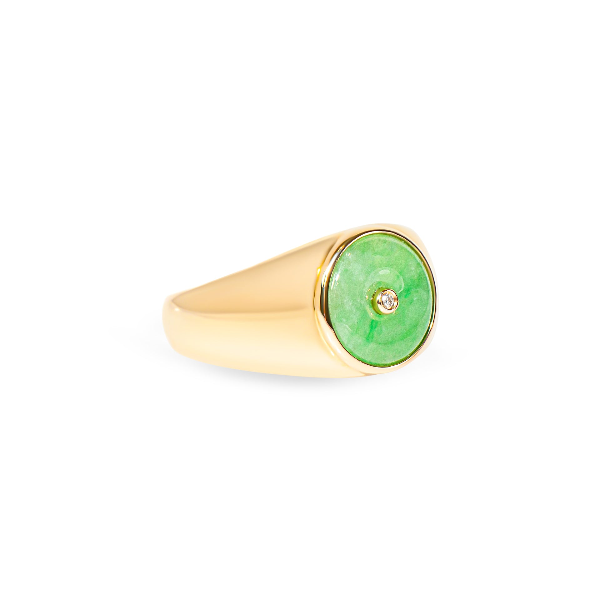 Gold ring with a green jade and diamond on a white background