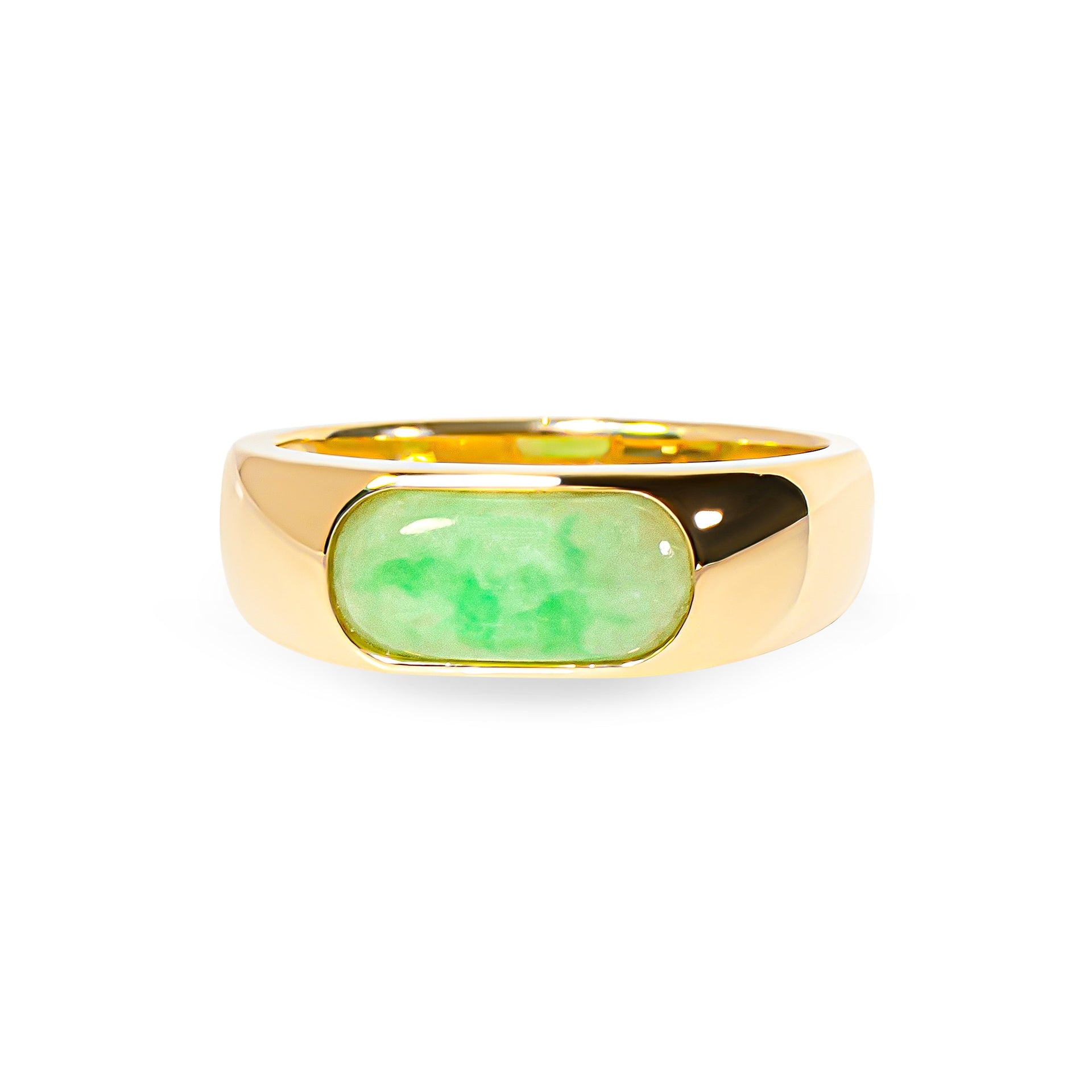 Gold ring with a green jade on a white background