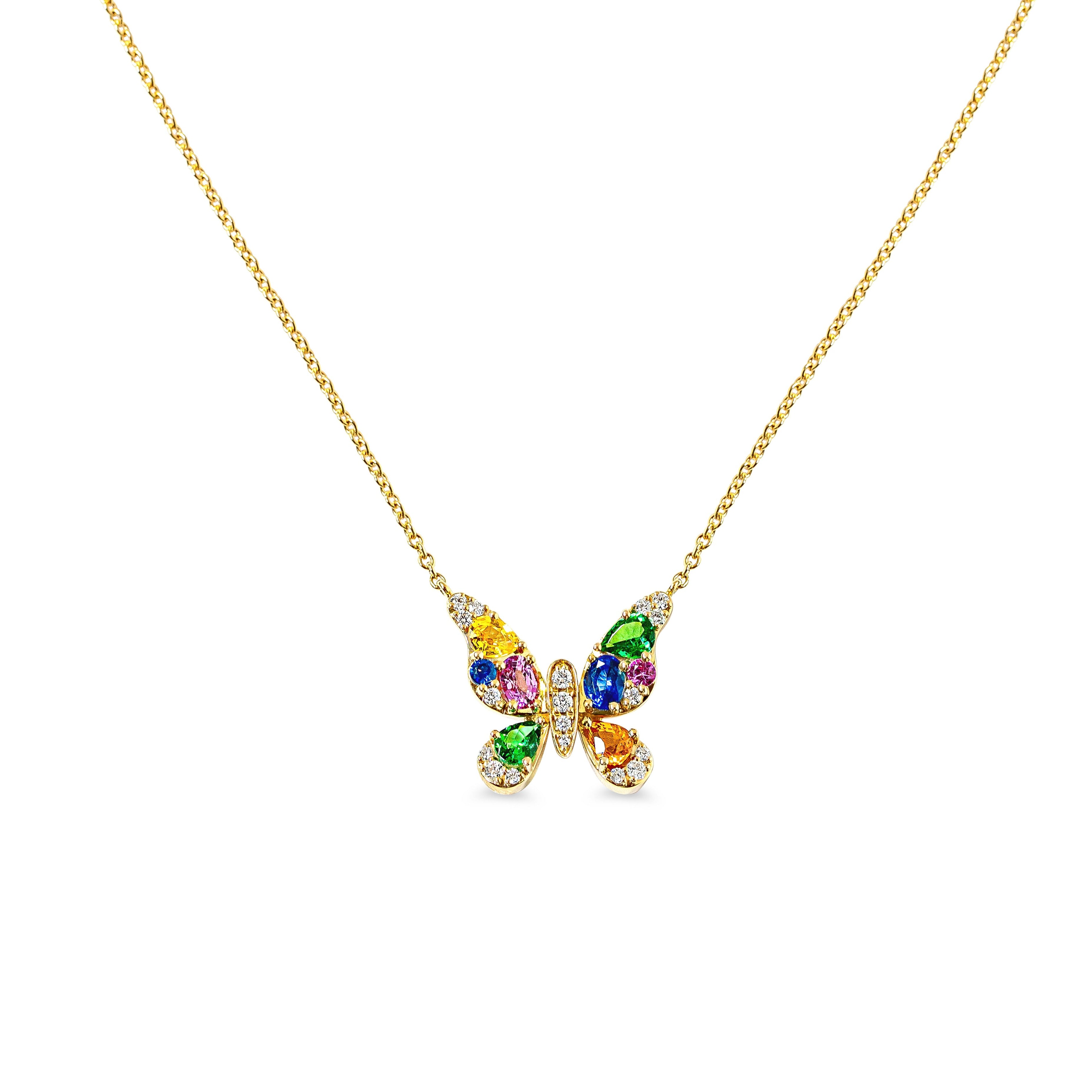 Butterfly-shaped necklace with colorful sapphires and diamonds on a gold chain against a white background