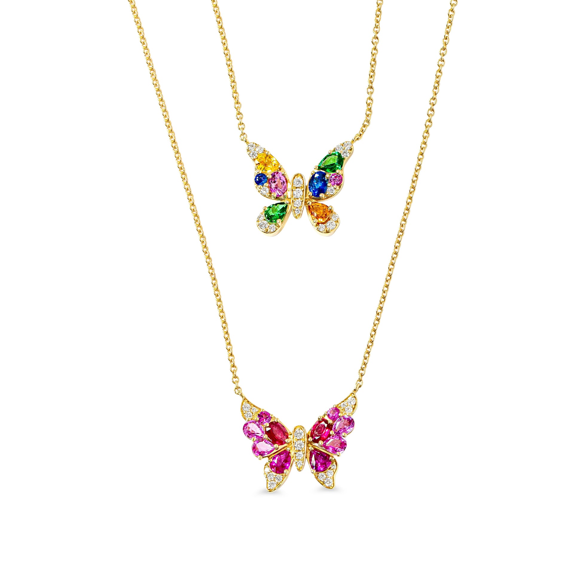 Butterfly-shaped necklaces with colorful gemstones on gold chains against a white background