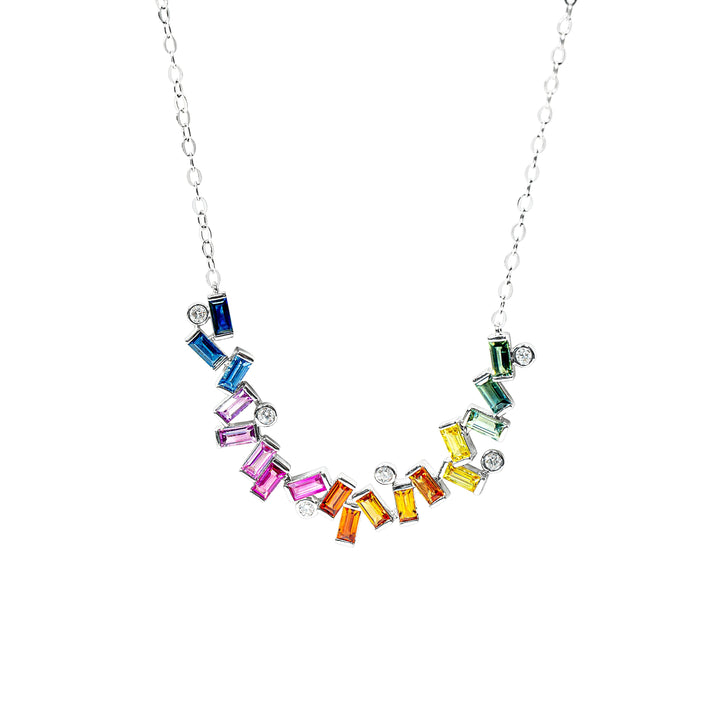 A silver chain necklace featuring a curved row of colorful baguette sapphires in blue, pink, orange, yellow, green, and purple, accented with round diamonds, shown on a plain white background.