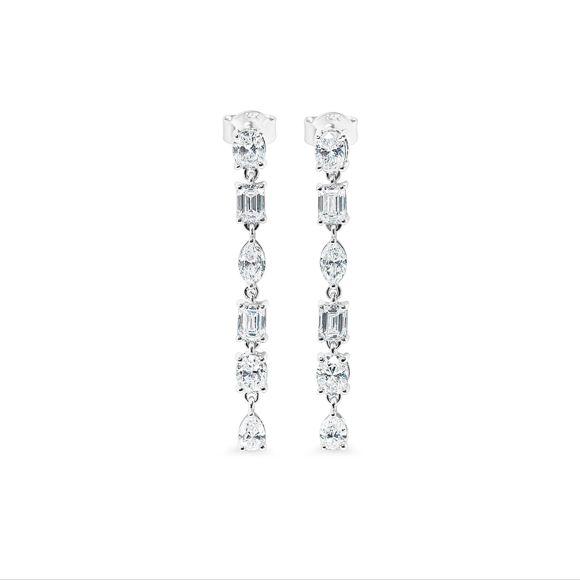 Pair of diamond drop earrings on a white background