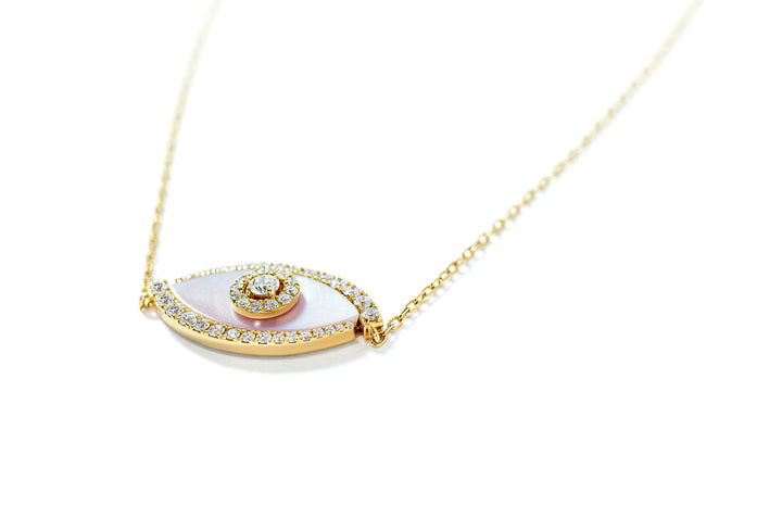 Gold necklace with a eye-shaped pendant made with pink mother-of-pearl and diamonds on a white background
