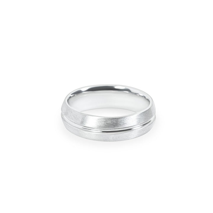 Stratus Men's Wedding band in 14k white. 6.5mm wide comfort fit band with a satin finish with centered groove. 