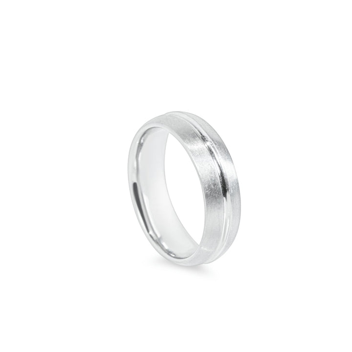 Stratus Men's Wedding band in 14k white. 6.5mm wide comfort fit band with a satin finish with centered groove. 