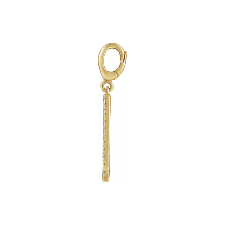 Gold charm with diamonds on a white background