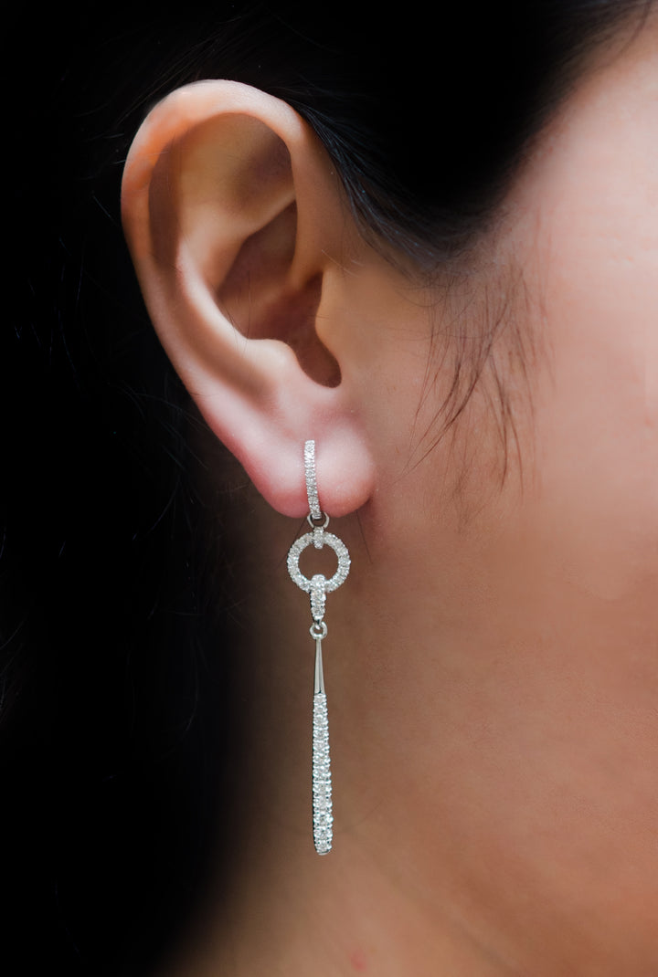 Dangle earrings. White gold and diamond. Bridal. Dainty. Circles with an elongated teardrop of gold and diamonds.