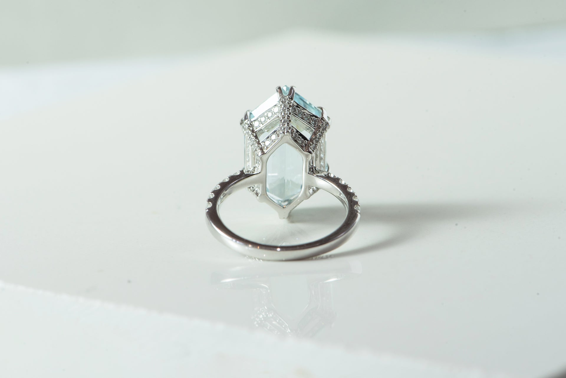 Aquamarine - step cut, hexagon. Set in white gold with diamonds. cocktail ring.