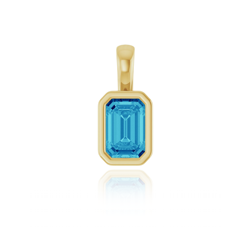 Gold pendant with a blue zircon gemstone on a white background
