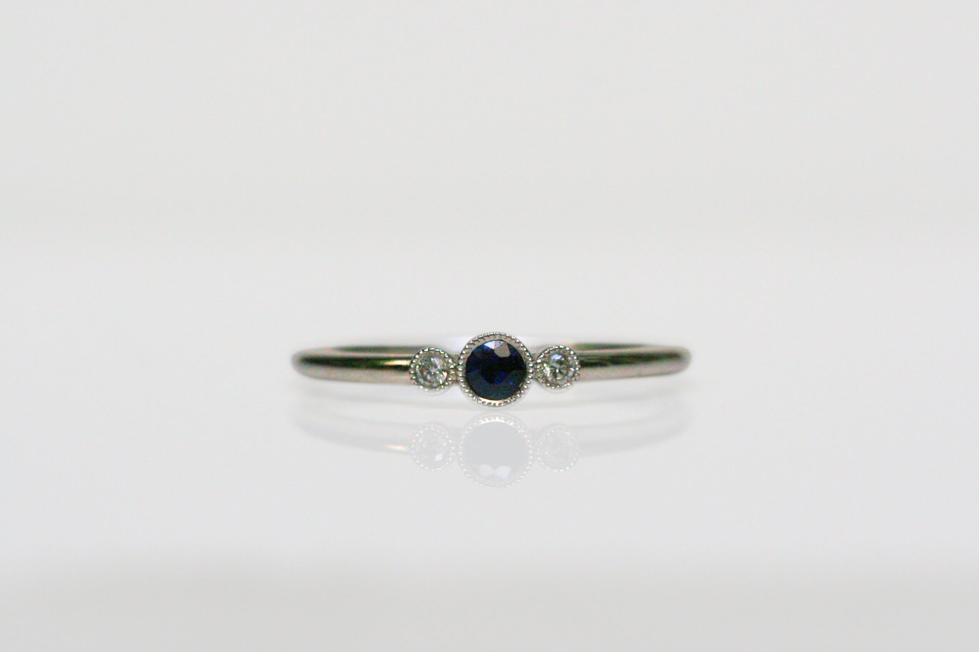 sapphire ring. blue stone ring. blue ring. round sapphire, diamond, white gold ring. dainty ring. every day. stacking. ring. vintage. millgrain. SF jewelry, local jeweler, luxury, fine jewelry, bay area, handmade, gift for her, birthday gift, anniversary gift. september birthstone.