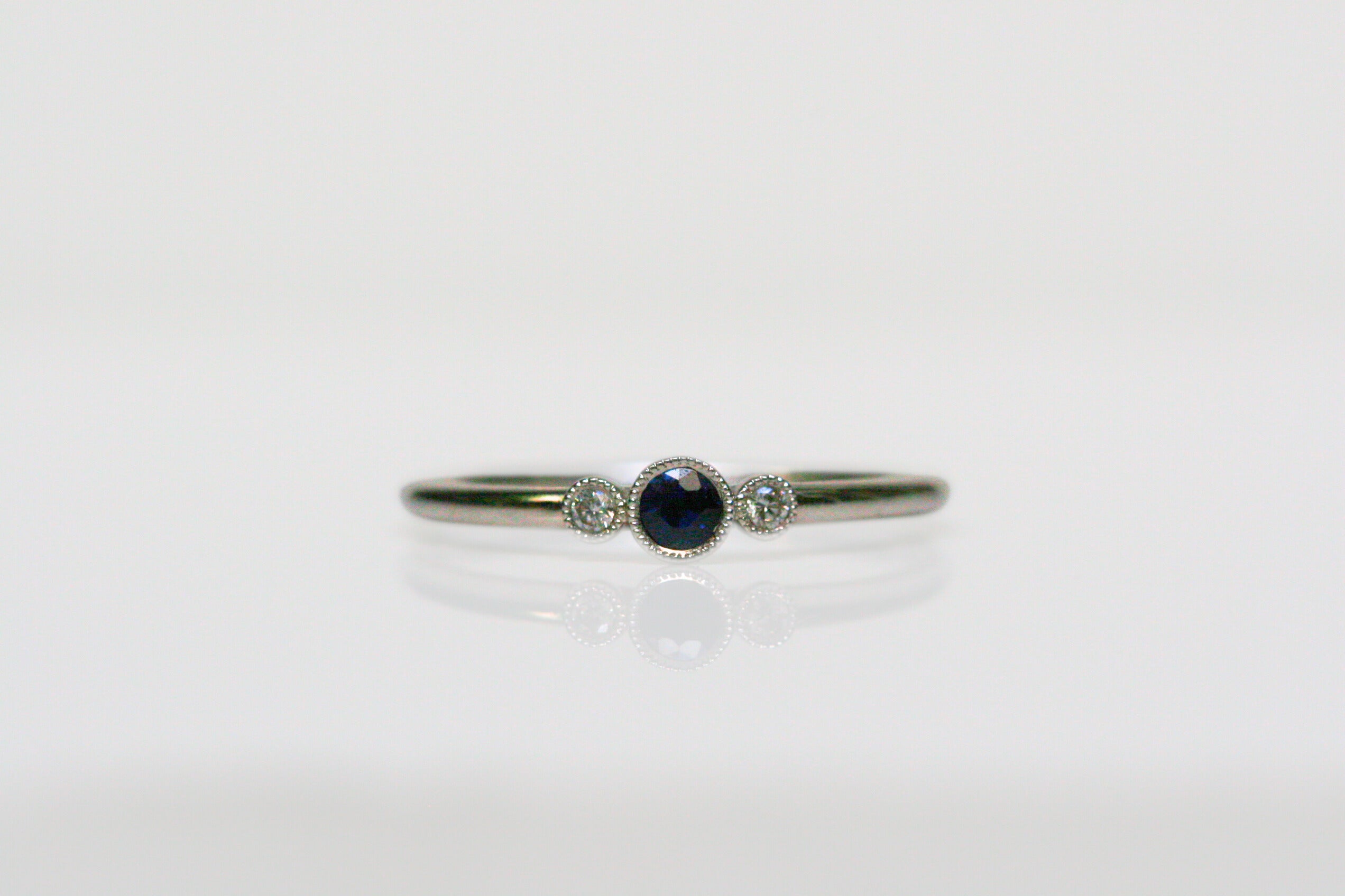 sapphire ring. blue stone ring. blue ring. round sapphire, diamond, white gold ring. dainty ring. every day. stacking. ring. vintage. millgrain. SF jewelry, local jeweler, luxury, fine jewelry, bay area, handmade, gift for her, birthday gift, anniversary gift. september birthstone.