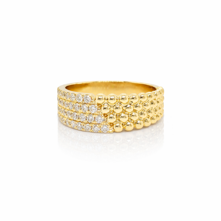Gold ring with embedded diamonds and beaded texture on a white background