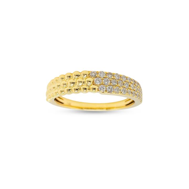 Gold beaded ring with diamond accents on a white background