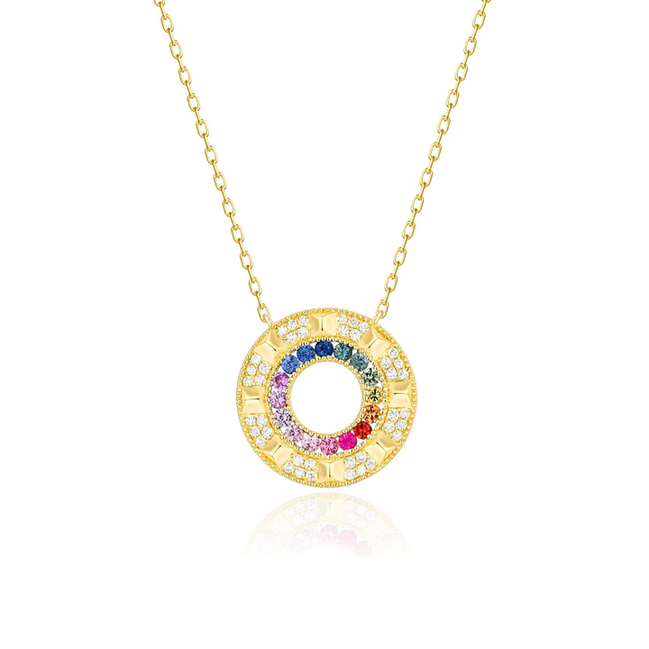 Gold necklace with a colorful circular pendant on a white background