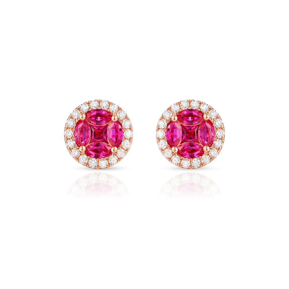 Pair of earrings with pink rubies and diamond accents on a white background