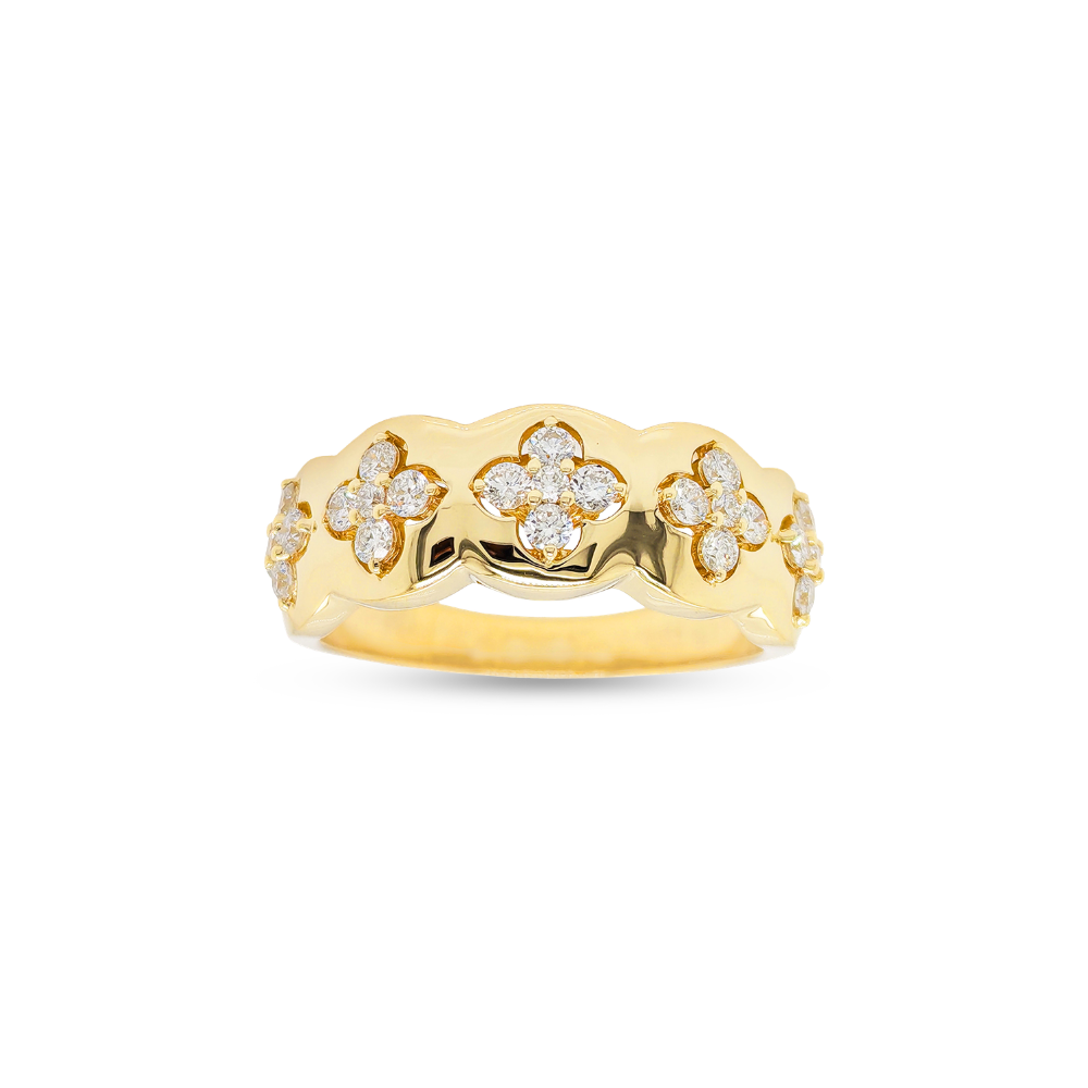 Gold ring with floral diamond accents on a white background