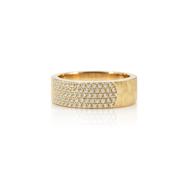 Gold ring with embedded diamonds on a white background