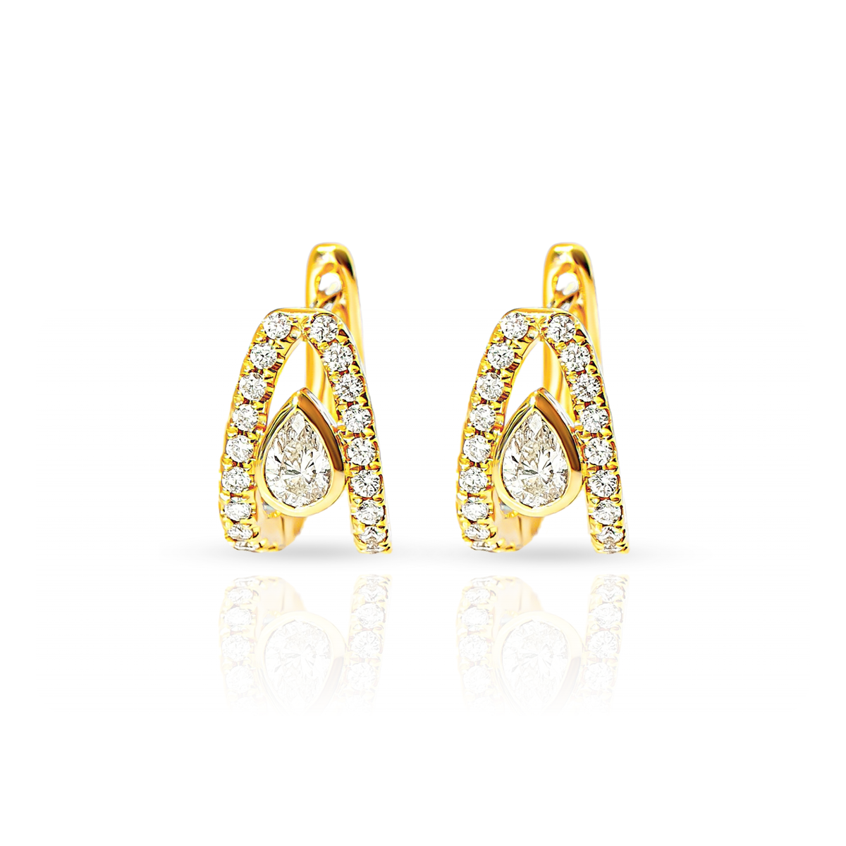 A pair of gold huggie hoop earrings accented with small pavé diamonds and a central pear-cut diamond, shown on a clean white background with a soft reflection below.