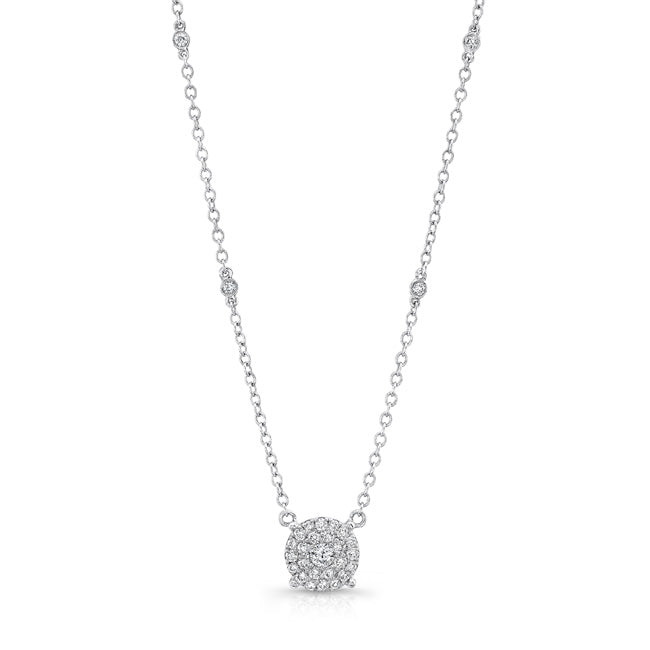 White gold diamond necklace. Cluster of diamonds in a circle - looks like one large diamond. Unique. Diamonds on the chain in diamond by the yard style.